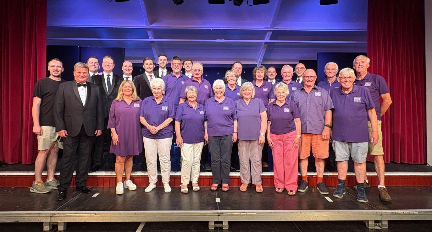 The GGDPMF committee and volunteers with Only Men Aloud